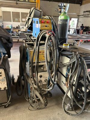 many different types of welding equipment in this garage