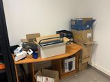 a room with boxes and boxes on the floor