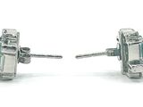 pair of emerald and diamond stud earrings on a white background