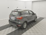 a picture of a grey car parked in a garage