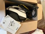 a box with a vacuum and other items inside of it
