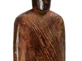 a wooden bottle with a hat on it