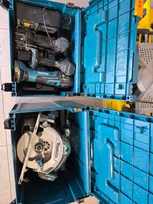 a blue tool box with tools inside of it