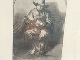 an old picture of a man sitting on a chair reading a book
