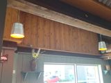 a light that is hanging from the ceiling of a restaurant