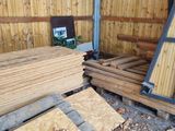 many pieces of wood stacked on top of each other