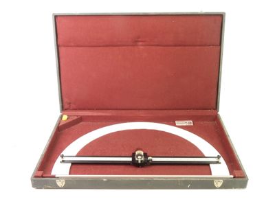 a tool in a case that is open on a white background