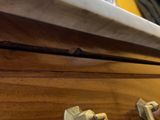 a close up of a drawer with a handle on it