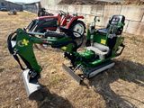 a small machine that is sitting in the grass