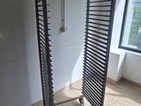 a room with a window and a rack in it