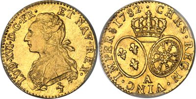 une pièce souveraine en or surmontée d'une couronne