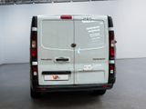 a white van that is parked in a room