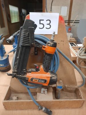 a box with a stapler and a corded stapler on it