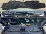 a car with its hood open and the hood up