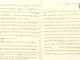 un gros plan d'un morceau de papier sur lequel on a écrit