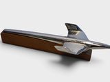 a silver airplane on a wooden stand on a white background