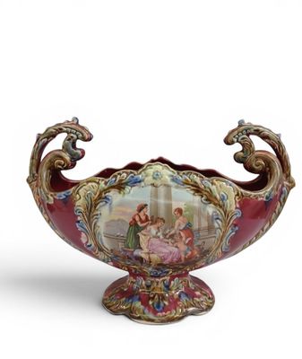 a vase that has a picture of a woman on it