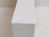 a close up of a white box on a counter