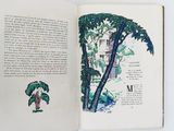 an open book with a picture of a tree on it
