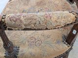 a close up of a piece of fabric on the back of a chair