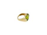 an image of a gold ring with a peridot stone