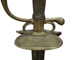 an image of a close up of a sword on a stand