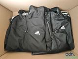 a box that has two jackets inside of it