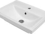 un gros plan d'un lavabo de salle de bains muni d'un siphon