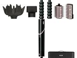 un sèche-cheveux, un peigne, une brosse et d'autres objets sur fond blanc