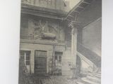 an old picture of an old building with a staircase