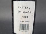 a bottle of wine that is sitting on a table