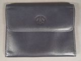 an image of a black leather wallet sitting on top of a table