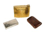 three different types of metal items including a cigarette case, lighter, and lighter