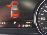 a picture of a car on the dashboard of a car