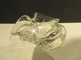 a glass bowl that is sitting on a table