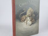 un vieux livre avec une image représentant un lion et un chat