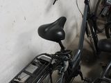 two bikes parked next to each other in a room