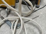 a bunch of hoses that are laying on the ground