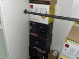 many boxes stacked on top of each other in a closet