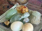 a glass plate with rocks and stones on a table