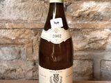 a bottle of wine that is sitting on a table