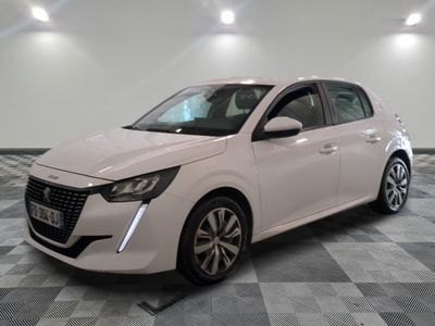 the white car is parked on a checkered floor in a room
