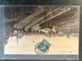 a picture of a postcard with a train coming down the tracks