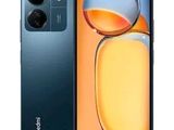 vue arrière et latérale d'un smartphone noir équipé d'une loupe