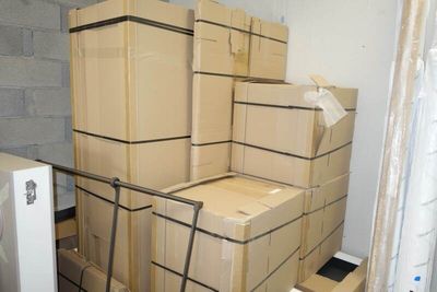 boxes stacked on top of each other in a room