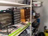 a room with a lot of items on the shelves