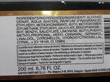 a close up of the label on the back of a bottle of liquid
