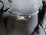 the jacket is black with a white label on it