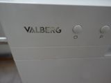 a close up of a white machine with the word valberg on it