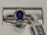 une image représentant une bague sertie d'une pierre bleue